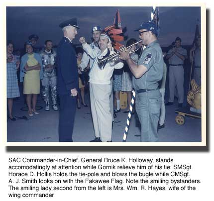 SAC CINC Holloway loses his tie to the Tie Pole also.