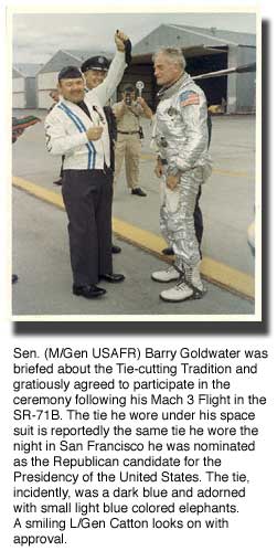 Gornik holds Goldwater newly removed tie aloft!