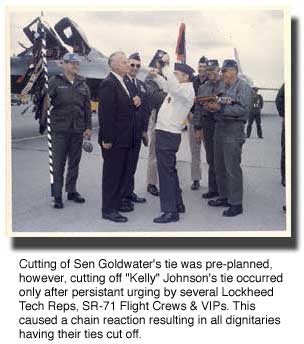 Johnson's tie is held aloft by Gornik